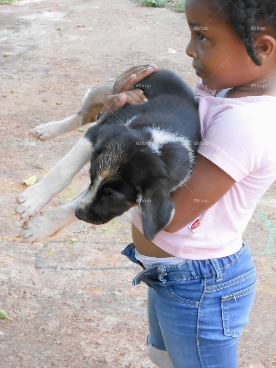 Girl Holding Puppy