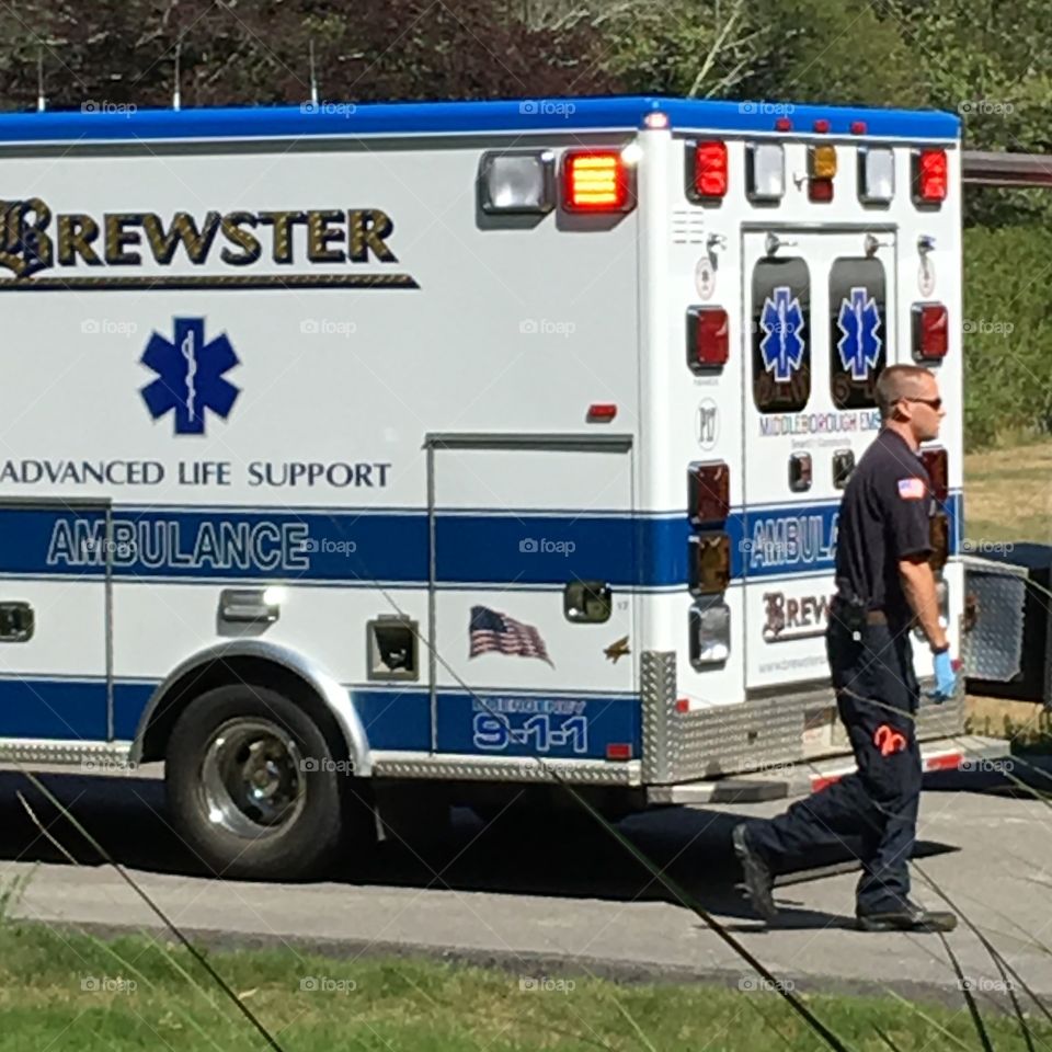 Ambulance with EMT walking away from truck🚑