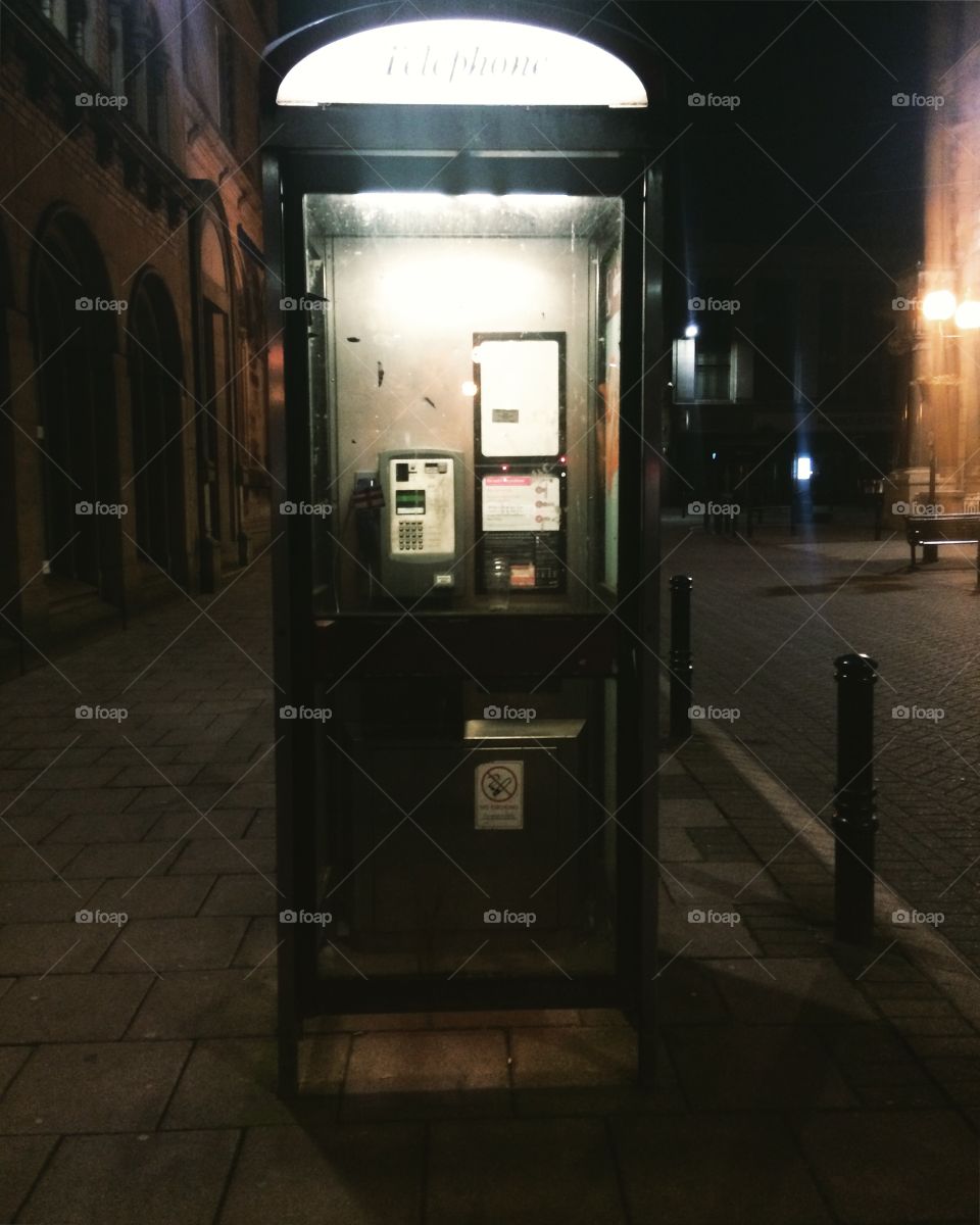 I was walking home late one night during summer and came across one of the older telephone boxes. It was dimly lit and slightly eerie so I decided to take a quick snap of it. This photo was taken in the City Centre of Carlisle, England.