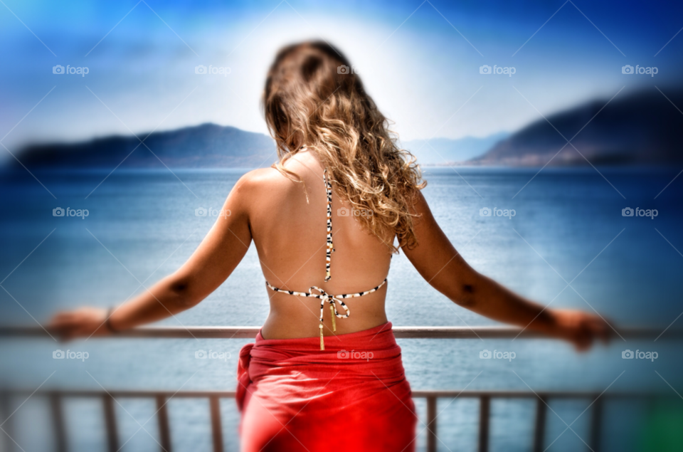 woman sea view greece summer potret by rigas