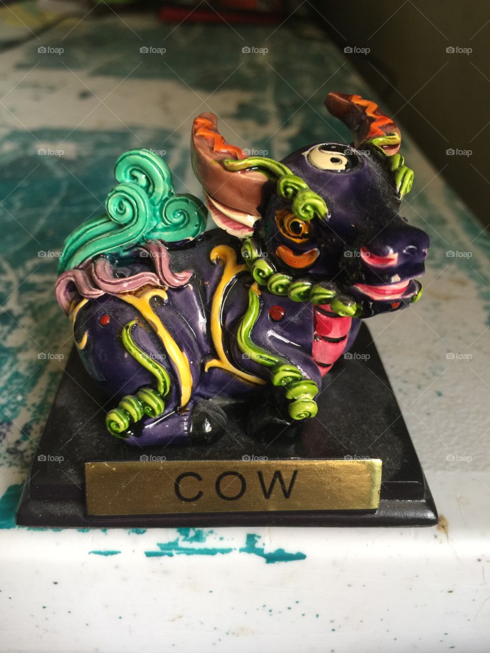 Ceramic cow statue