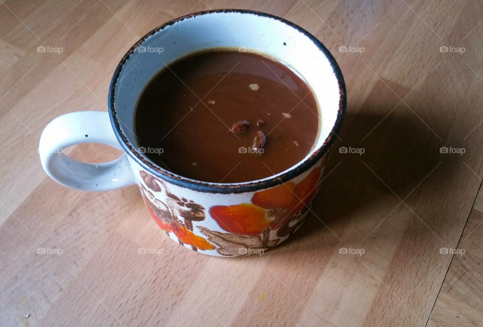 Spicy hot chocolate in a poppy cup