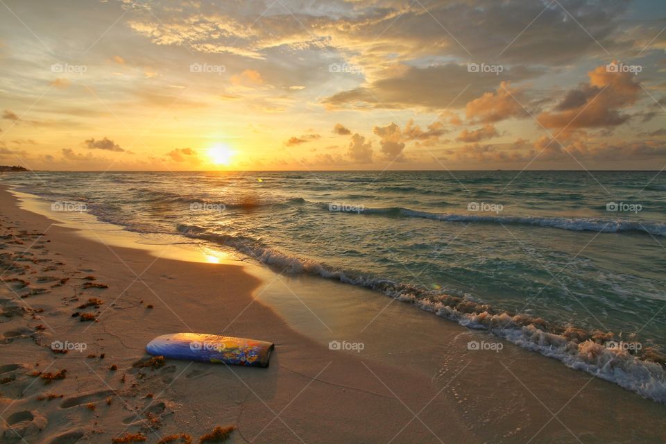 surf table in the beach at sunrise