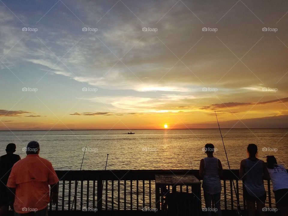 sunset fishing pier