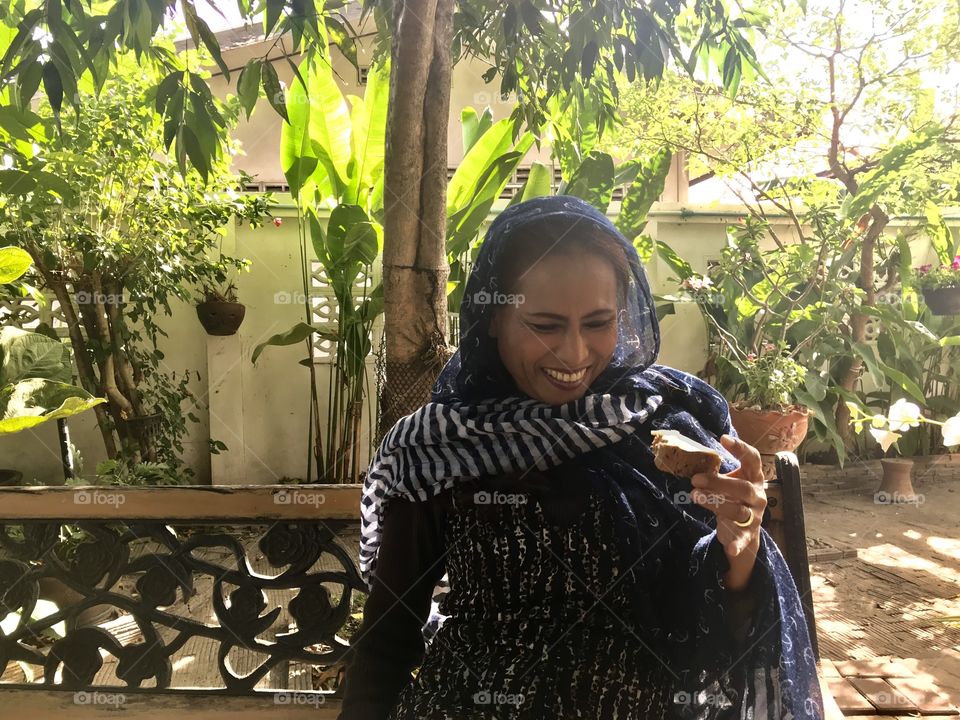 Mother enjoy breakfast in the garden 