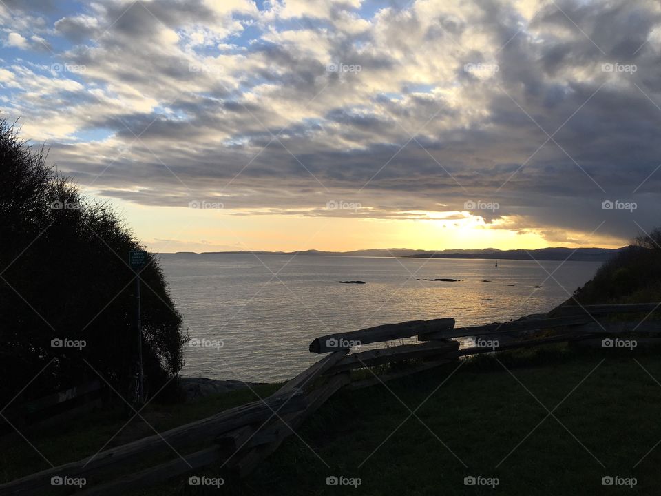 Scenic view of sea at sunset