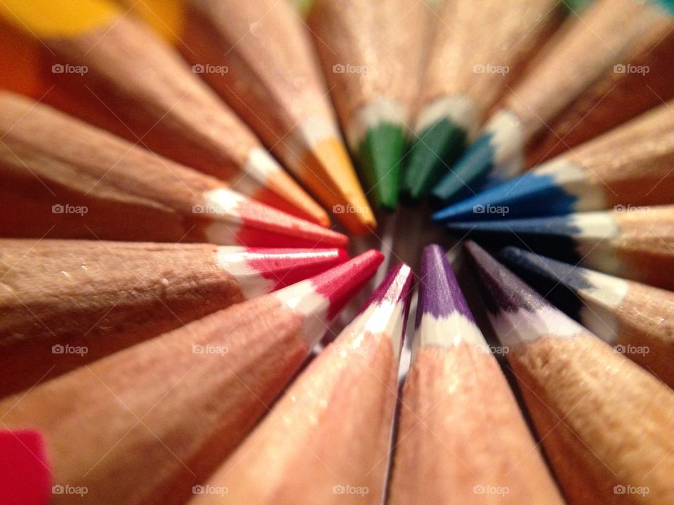 Circle of colorful pencils