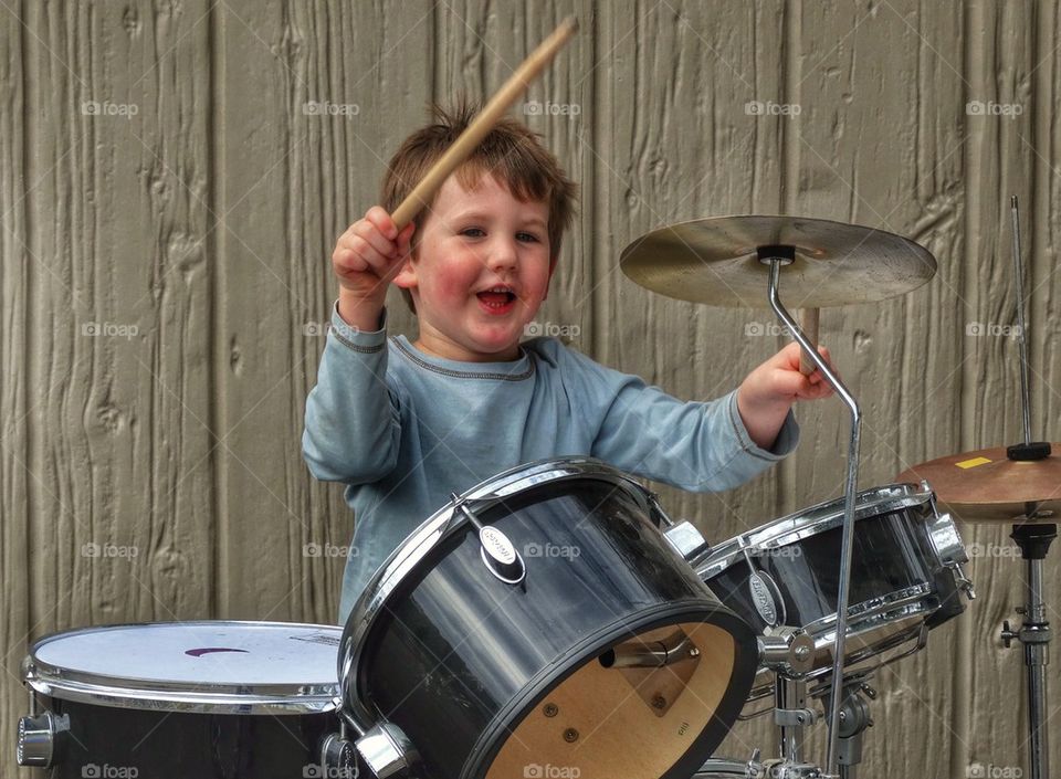 Little Boy Playing Drums