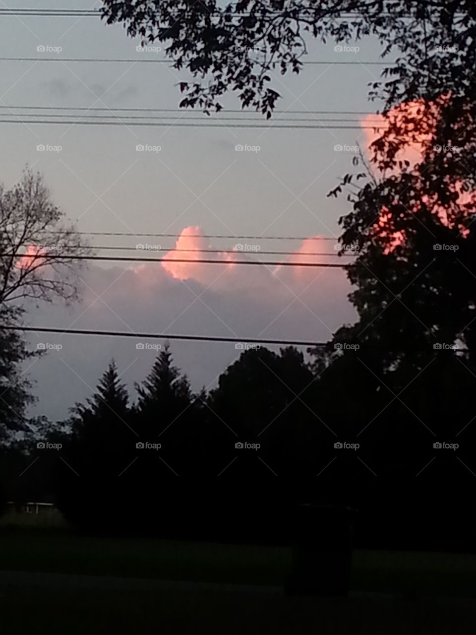Beautiful sunset with mountainous clouds.