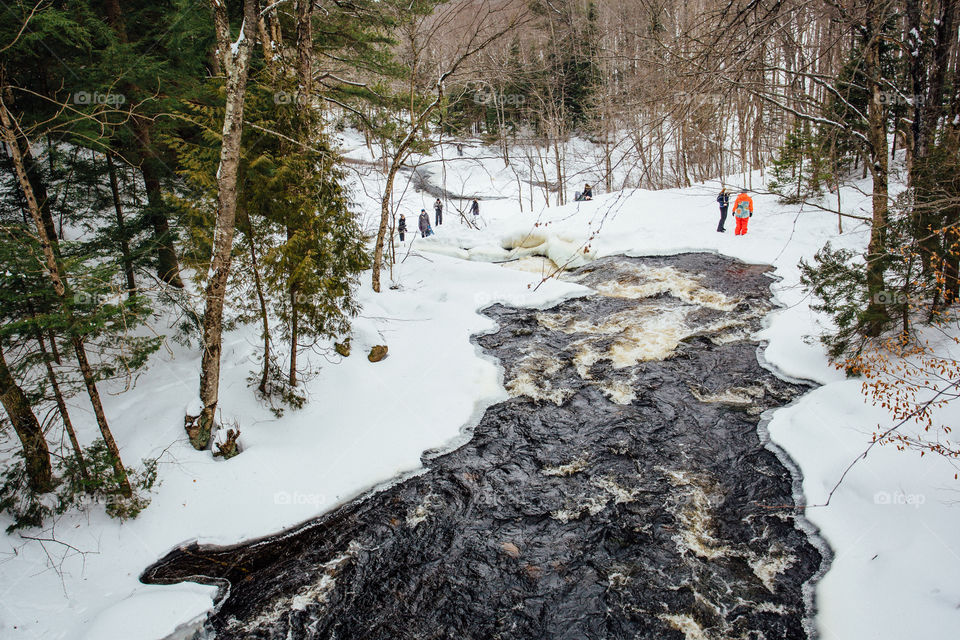 High angle view of frozen stream in winter