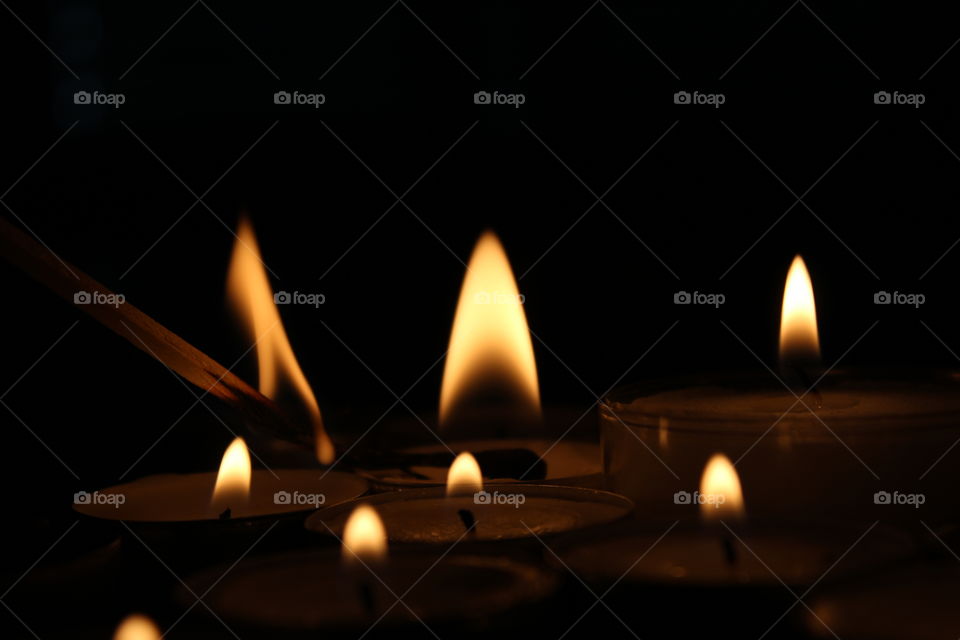 Candle Flames In Darkness