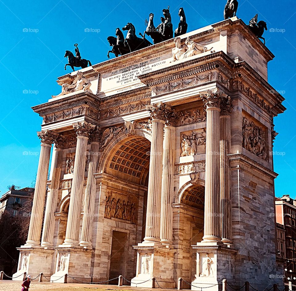 Arco della pace, one of the most important monument in Milan, kissed by the sun in a spring daylight. 