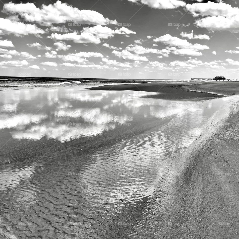Beach reflection of sky