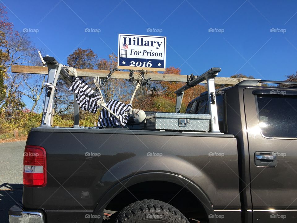 Truck with anti-Hillary Sign & skeleton in back☠️  "Hillary for Prison"