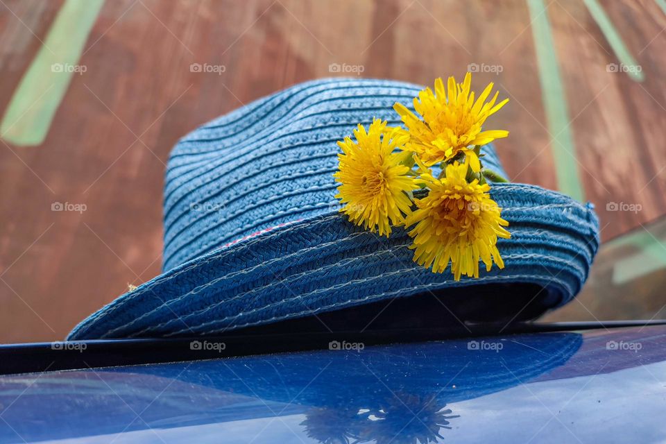 Blue Hat with Yellow Flowers