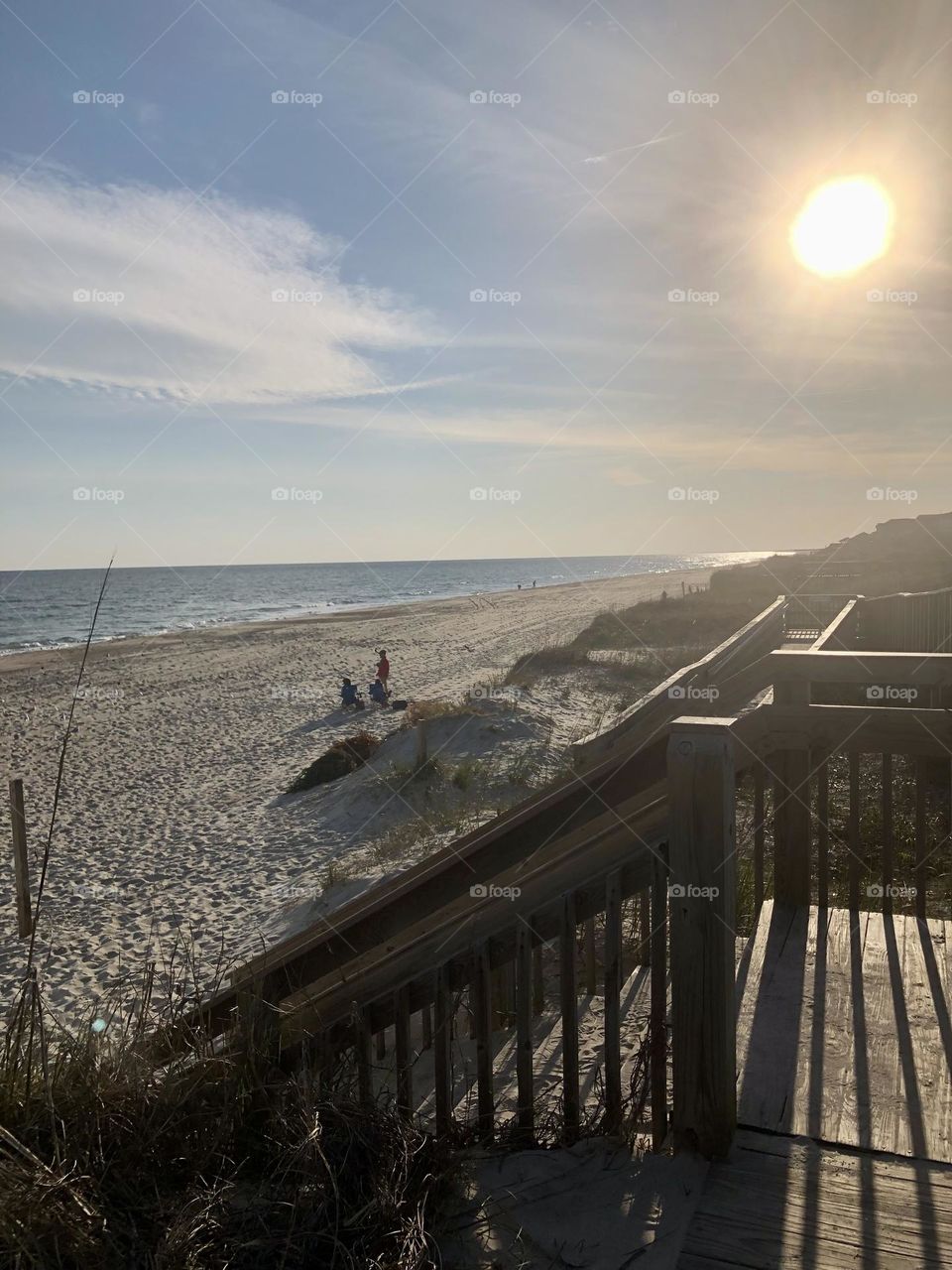 A shot along the Crystal Coast Beach line with sun shining high above in North Carolina. 