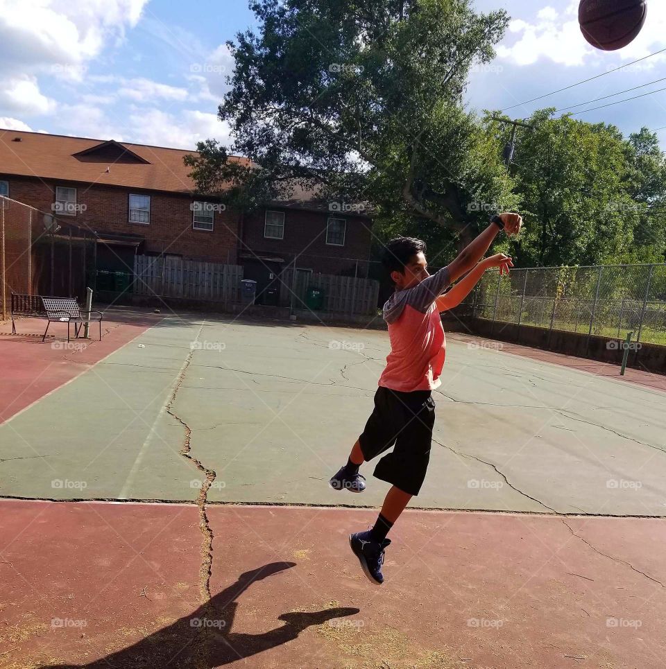 Practicing Basketball
