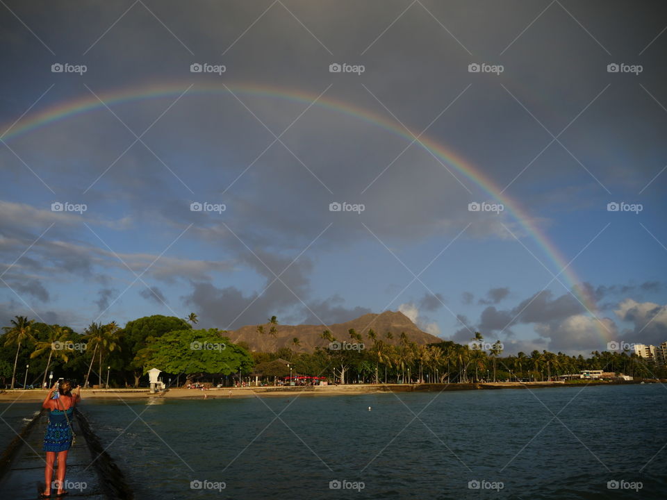 Rainbow from the pier in Waikiki Hawaii Honolulu 