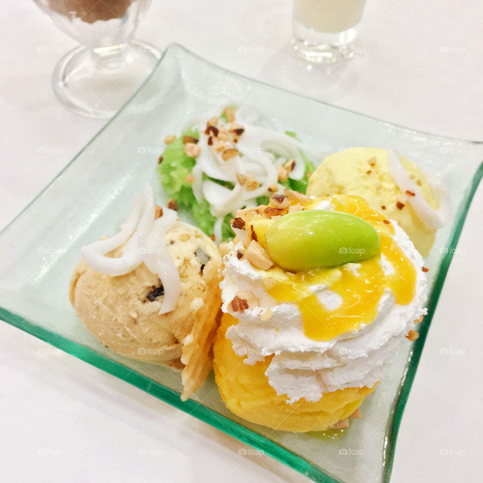 Summertime Ice Cream : Mango ice creams with green sticky rice, almond and fresh young coconut.