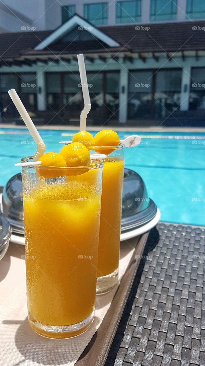 mango juice by the pool