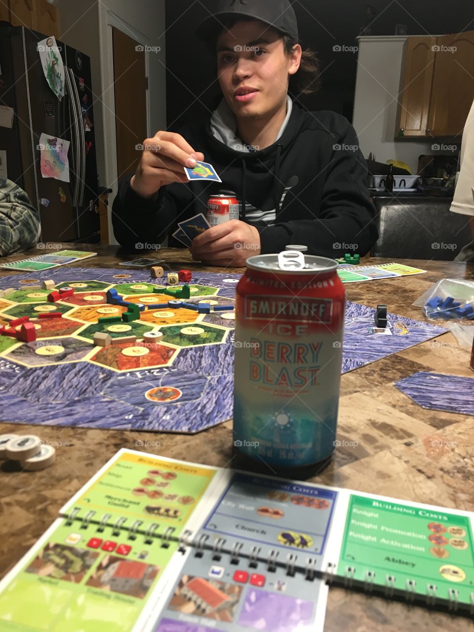 Having drinks and playing games 