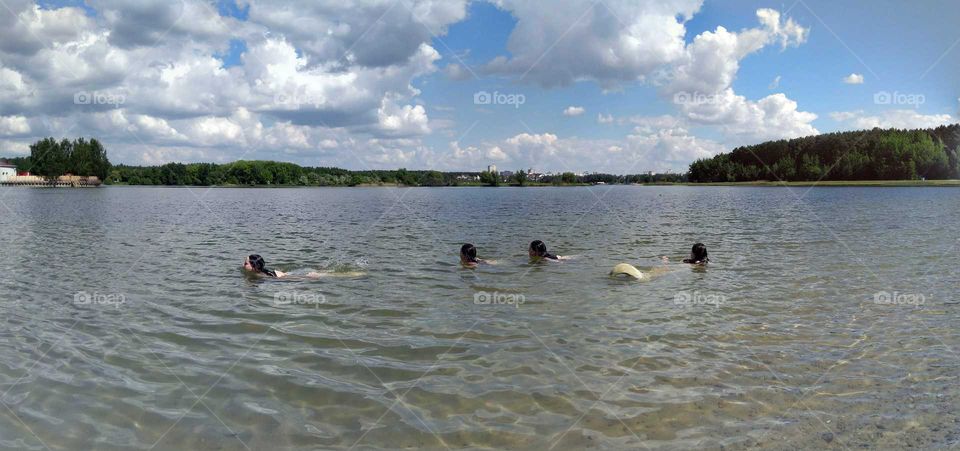 swimming on a lake summer time