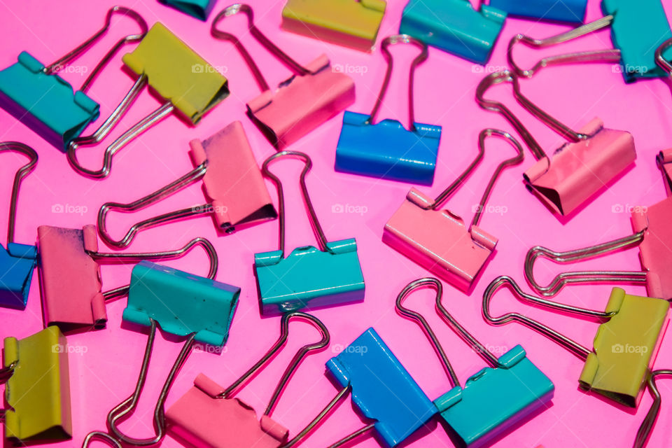 paper clip on pink background