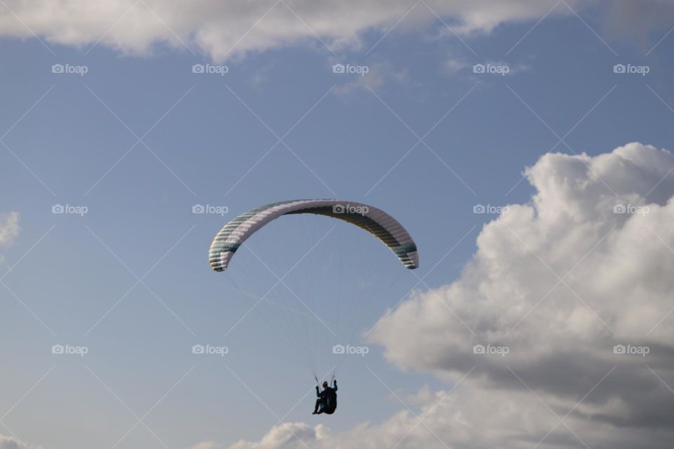 Paraglide among the clouds 