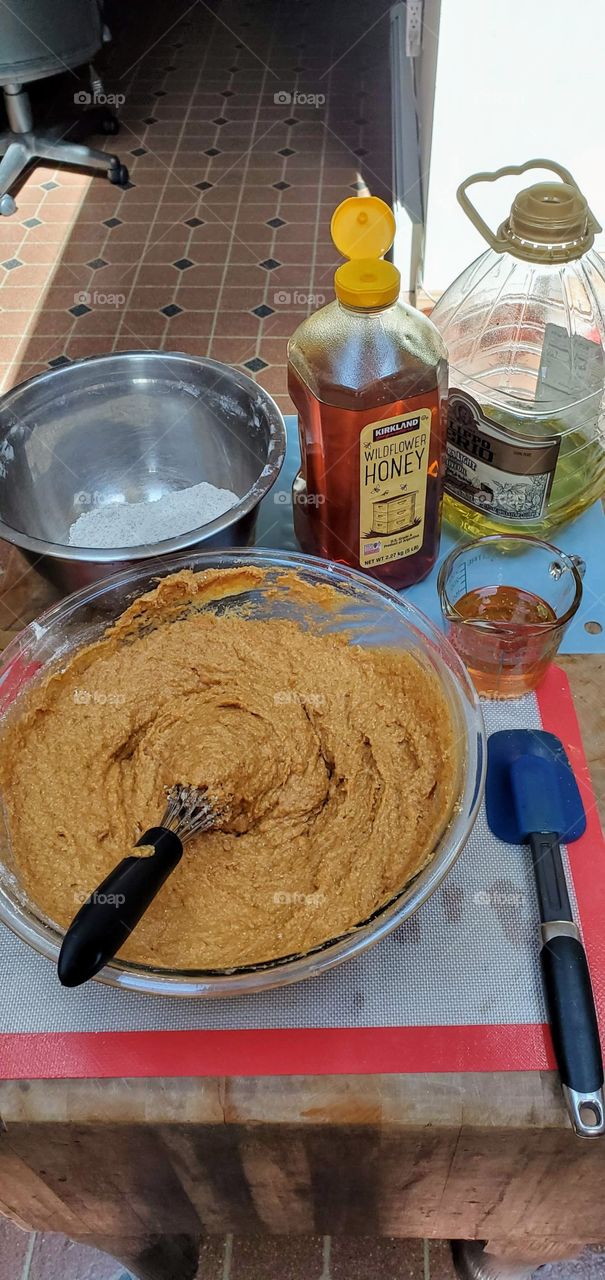 Ingredients in bowls & utensils for baking muffins. Hot oven is up to temperature!