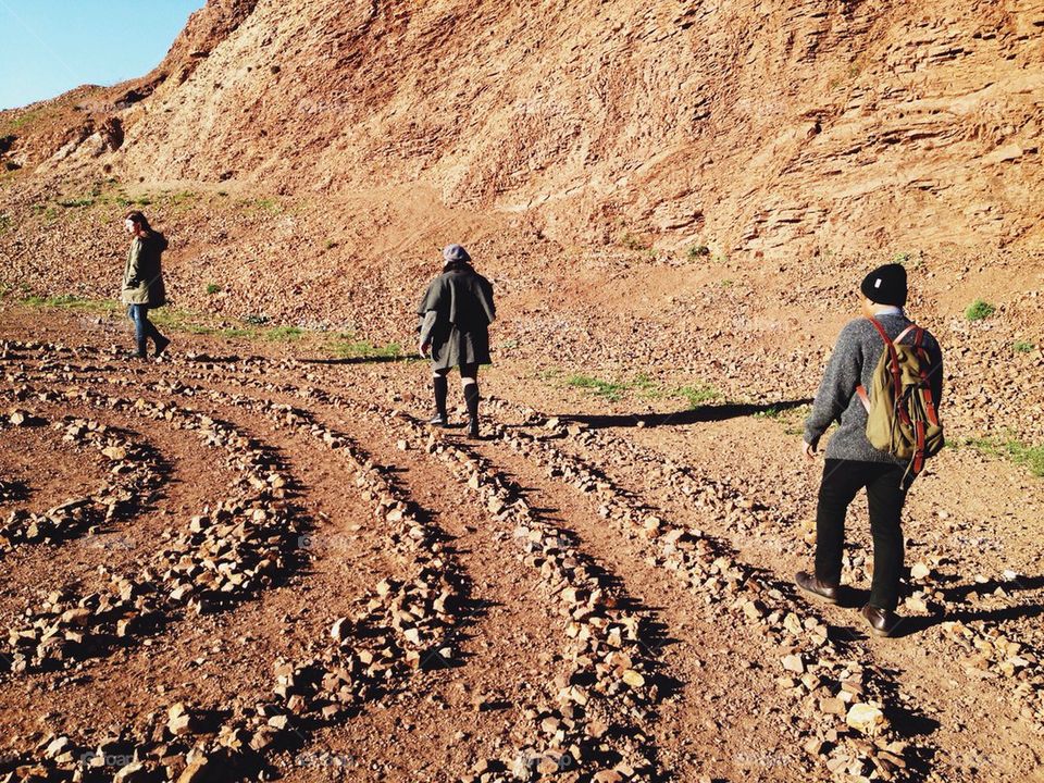 Friends hiking a maze