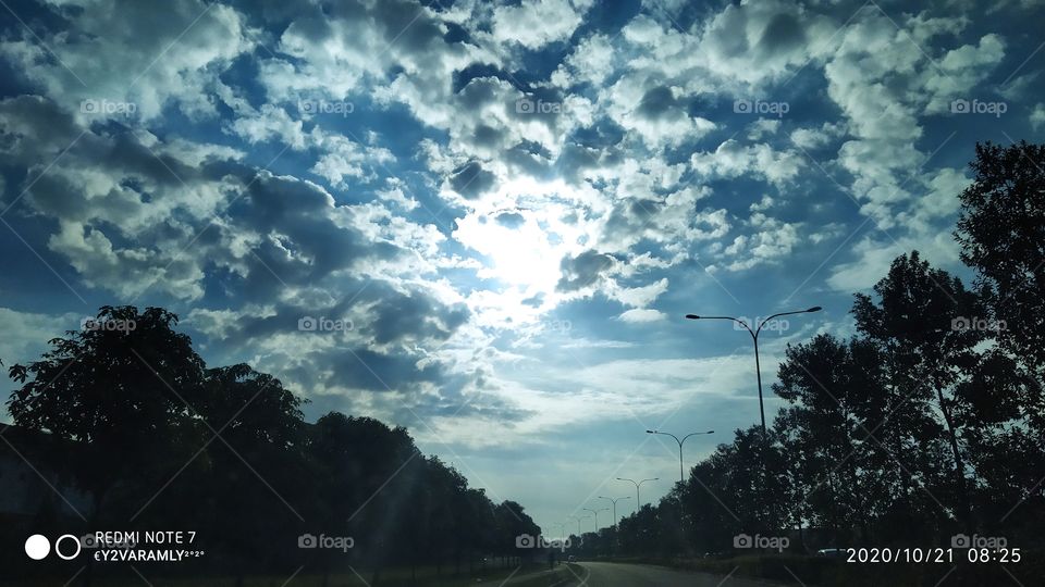 Sun Shining Through Cloud