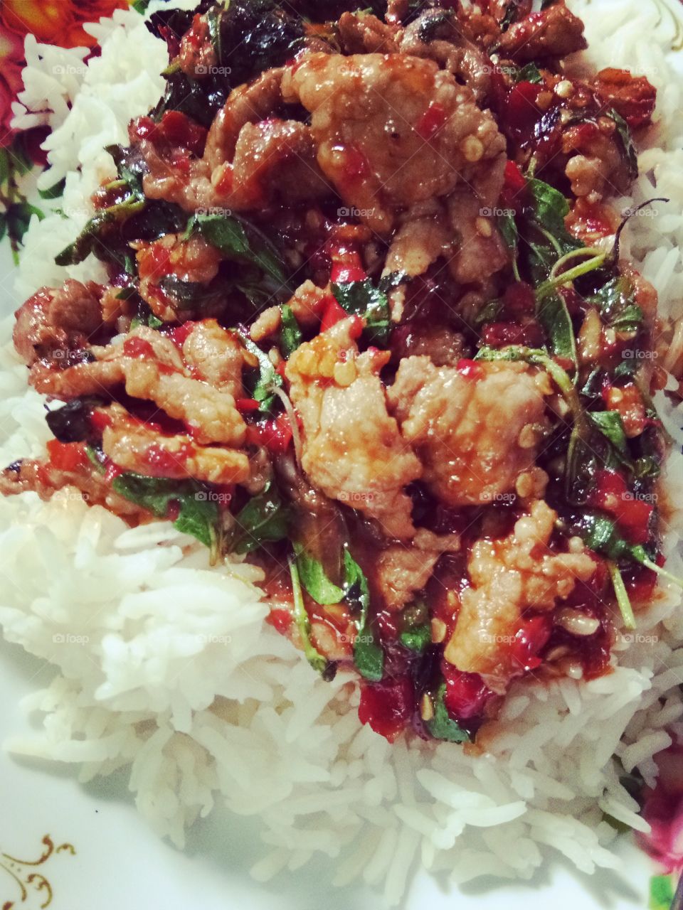 fried stir basil with pork
rice
spicy
delicious