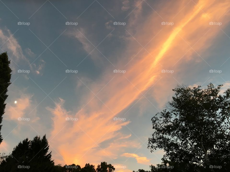 Wispy cloud at sunset