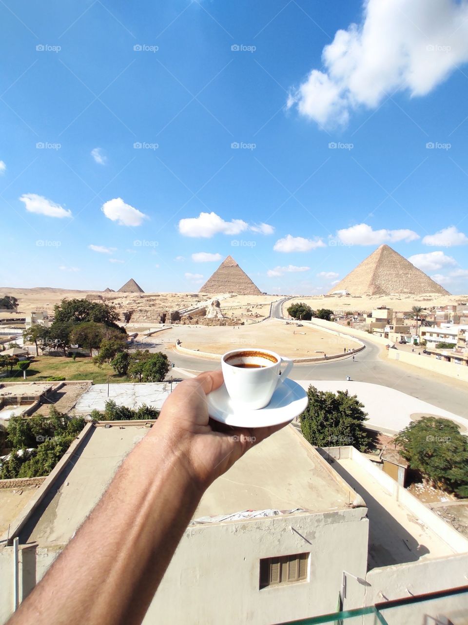 a great day in Great Giza Pyramids morning drinks coffee & and Egyptian tea with mint 
this is Egyp