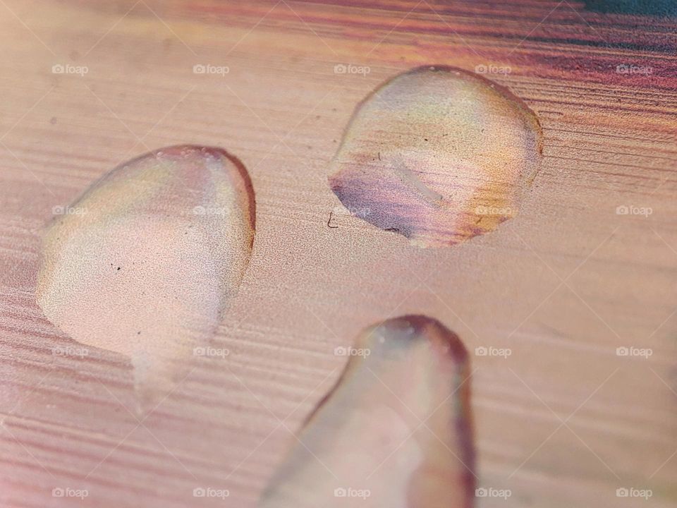 Droplets on a colourful background