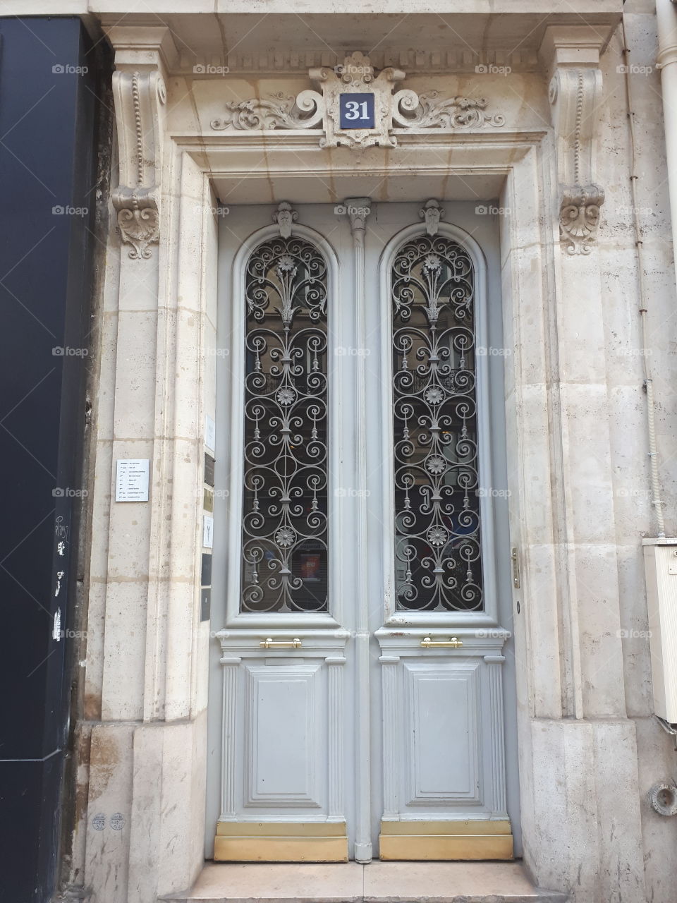 Wooden grey retro entrance door