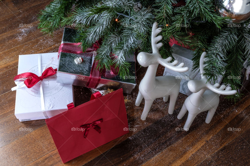 Christmas presents under Christmas tree