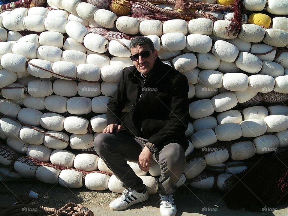 I m sitting beside a nits fishing.