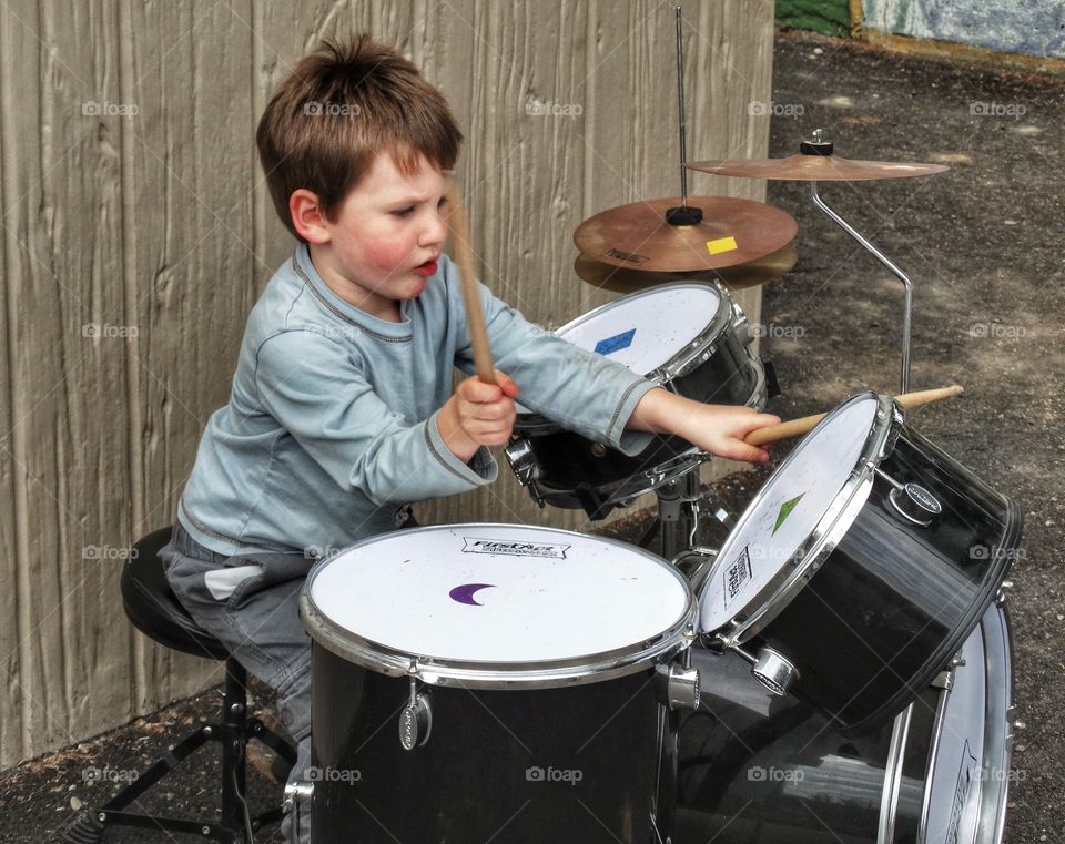 Little Boy Playing Drums