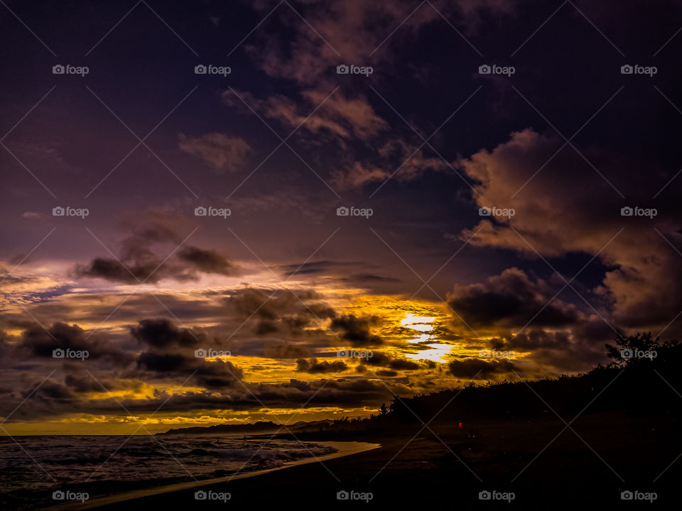 beautiful sunset on the beach in summer. it's a sign of summer. little cloudy but still beautiful. really beautiful of view in the evening.