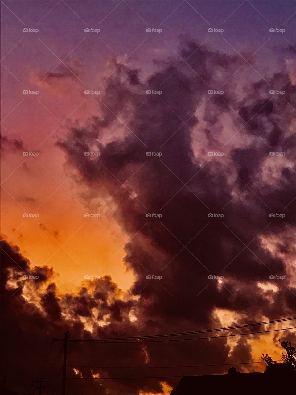 Do not call 911. This is a very mysterious cloud Figure. A monster from a Milky Way but a cloud form. 