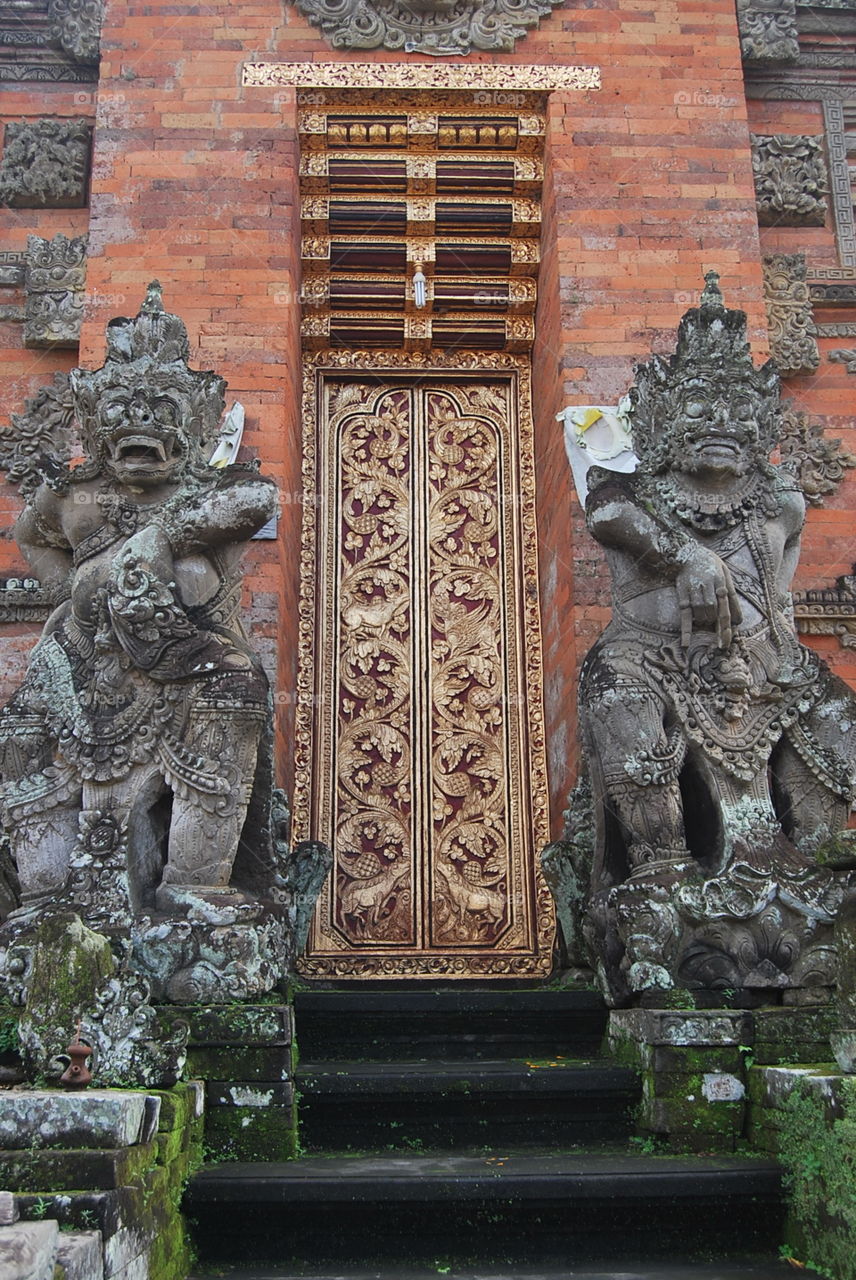 Hindu gods guarding the entrance of the temple