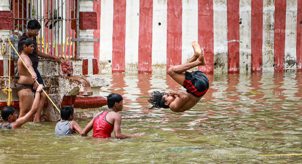 A Snap of slappibg of river water... enthu of a little boy who was bathing in river and enjoying