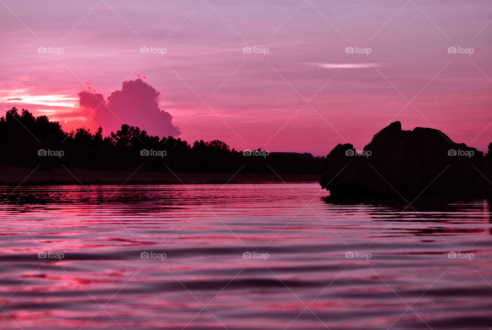 Pink sky reflection on lake