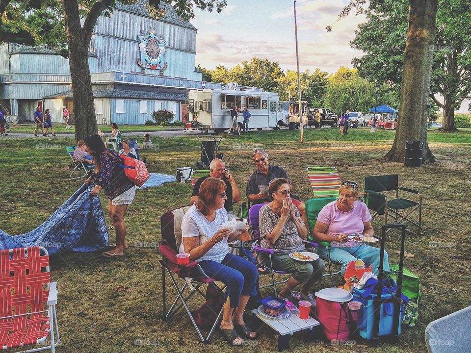 People enjoying at picnic