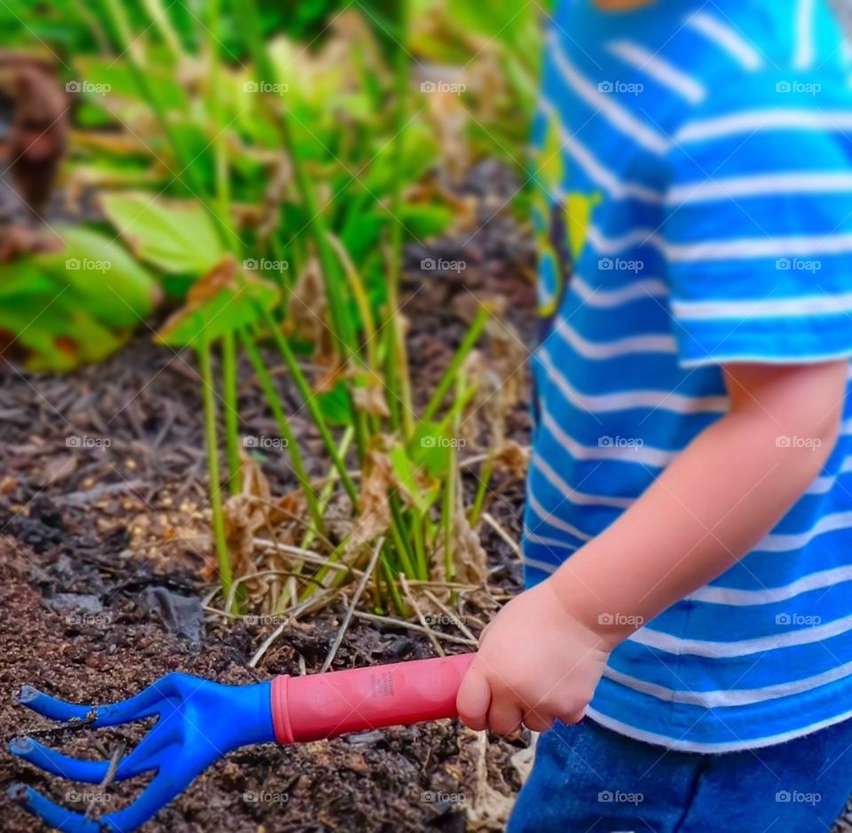 Patrick playing in the dirt.