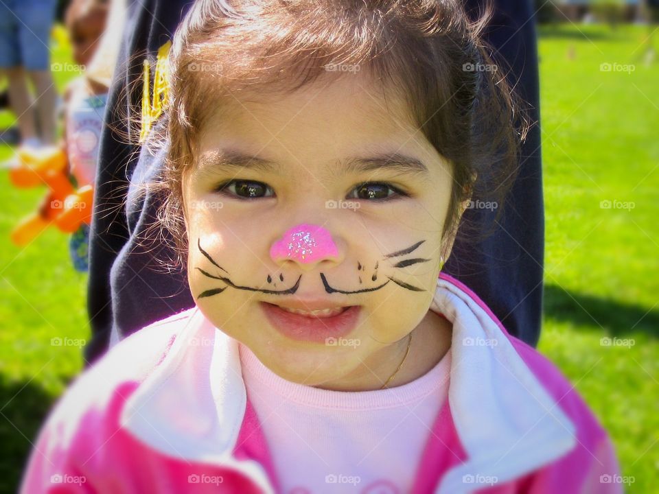 Girl Face painted and happy