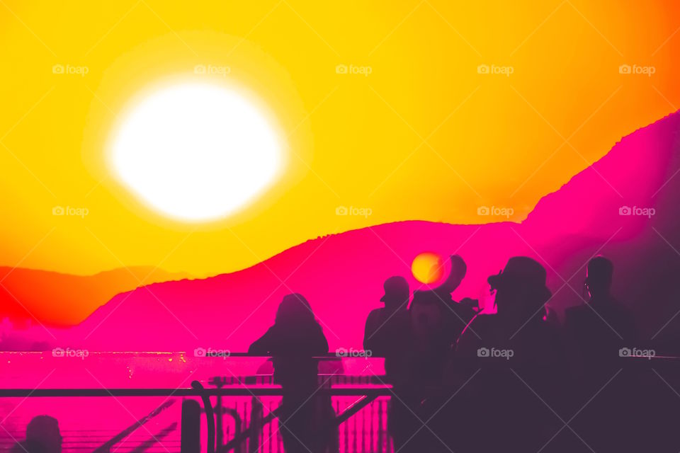 Crowd with summer sunset sky 