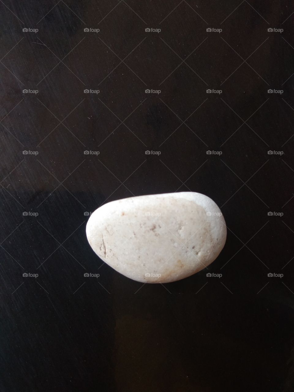 stone with a black background