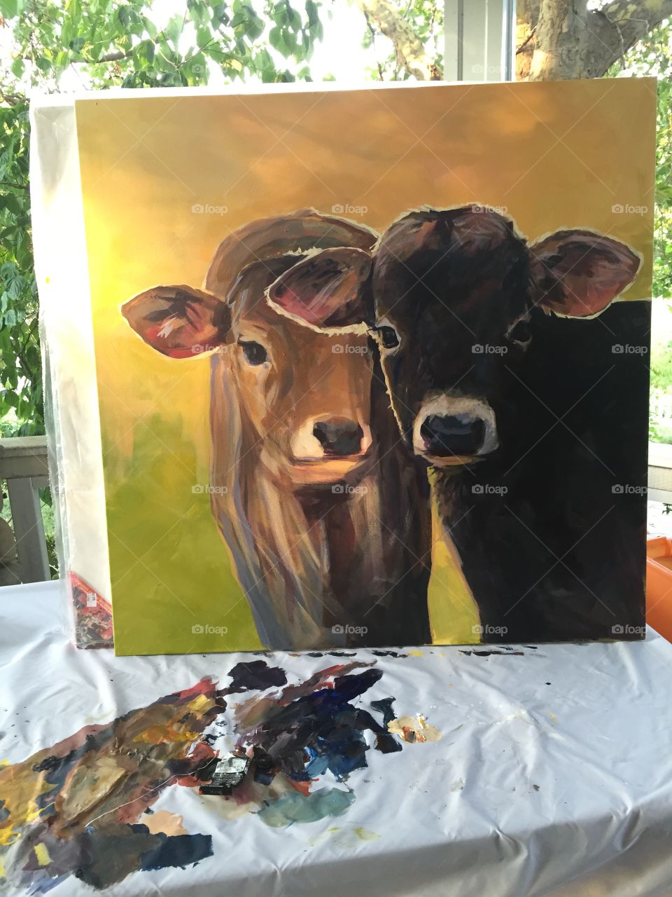 Two cows painting. My girlfriends Aunt Margie painted this on the front porch, it's amazing and I want it.
